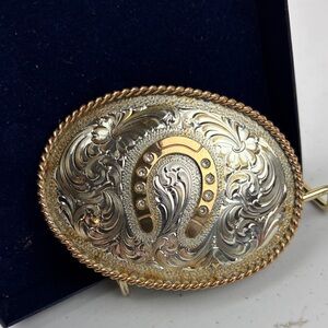 Montana Silversmiths Logo in silver and gold accents